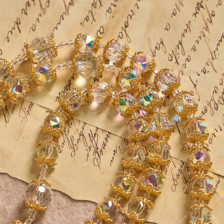 Christianartworkshop Schimmernder Rosenkranz aus facettiertem Glas mit Marienmedaille und goldenem Kruzifix - image 4
