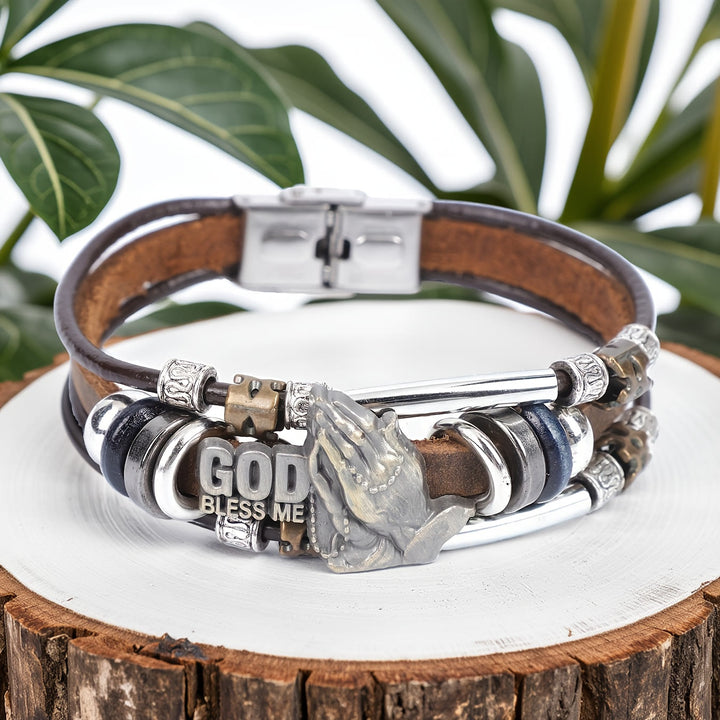 Christianartworkshop „Gott segne mich“ – Armband aus Leder mit betenden Händen und Metallelementen - Braun - image 0