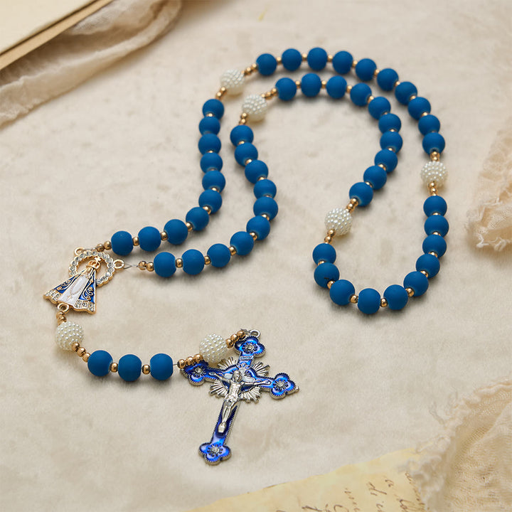 Christianartworkshop Rosenkranz aus mattblauen Gummiperlen mit Medaille Unserer Lieben Frau von Aparecida - image 2