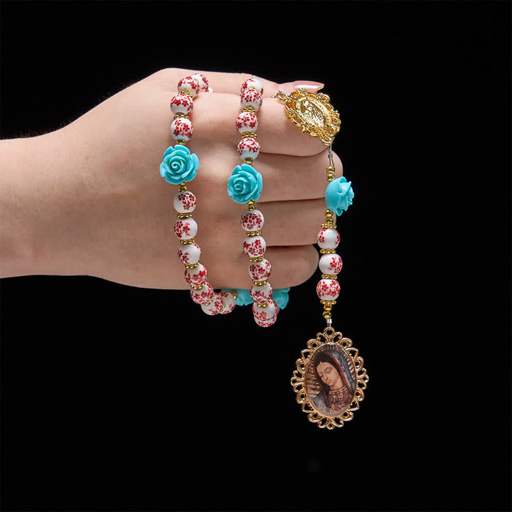 Christianartworkshop Rosenkranz der Sieben Schmerzen mit roter und weißer Keramikperle, türkisfarbener Rose und Marienmedaille - image 1