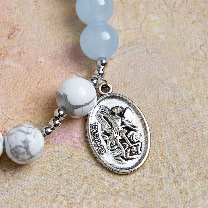 Christianartworkshop Armband aus natürlichem Howlithstein mit dem Heiligen Michael: Hellblau & Rosa – Doppelter spiritueller Schutz - image 14