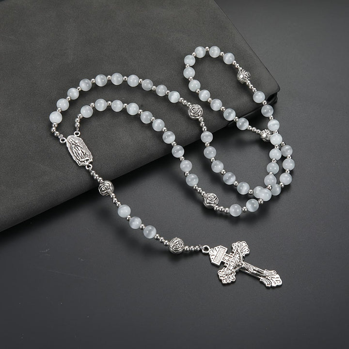 Christianartworkshop Leuchtender weißer Rosenkranz aus Katzenaugenstein mit Marienmedaille und kunstvollem Kruzifix - Rosenkranz aus weißem Katzenaugenstein - image 0