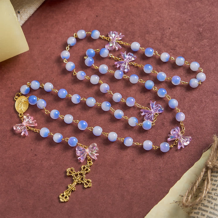 Christianartworkshop Rosenkranz mit UV-Farbwechsel-Glasperlen und lila Schleife: Wo Sonnenlicht auf Glauben trifft - image 5