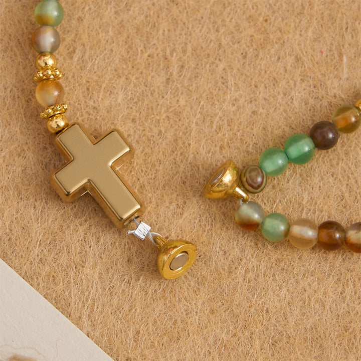 Christianartworkshop Magnetisches Rosenkranzarmband aus Drachenader-Achat mit goldenem St.-Benedikt-Anhänger - image 10