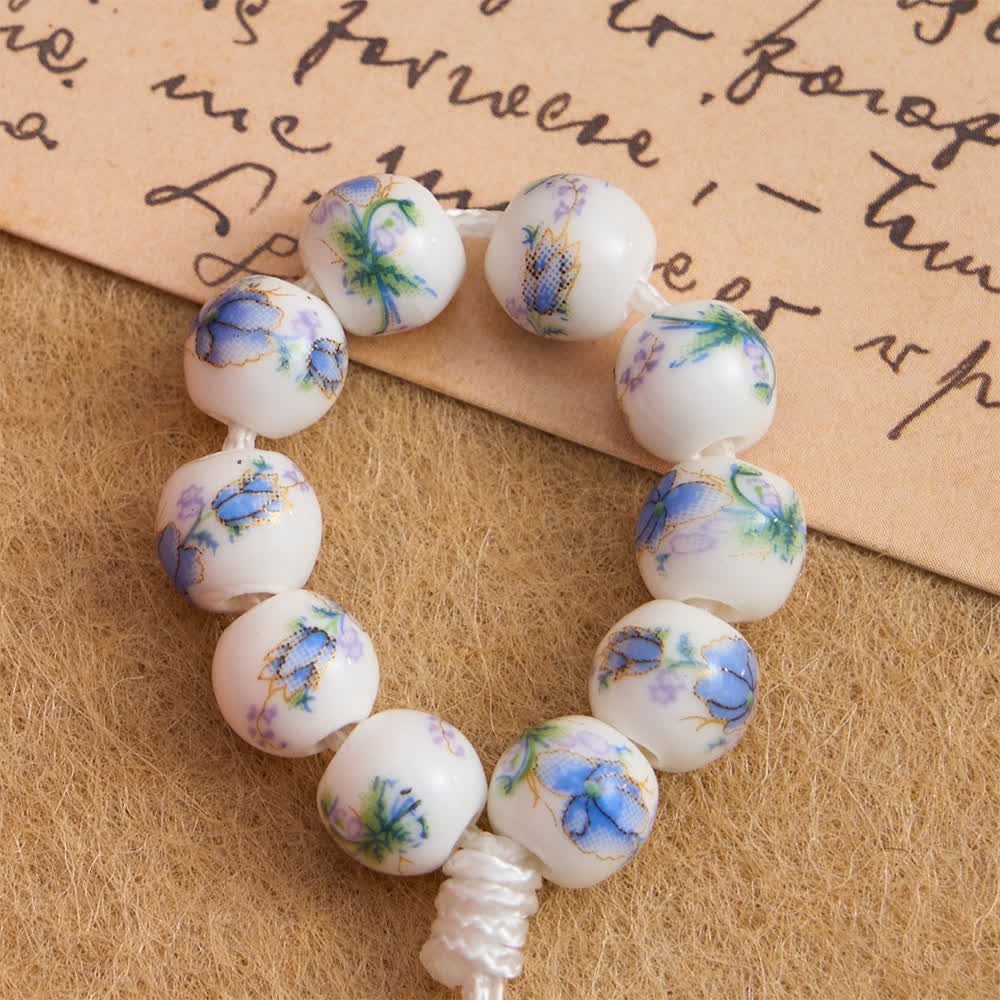 Christianartworkshop Blauer Rosenkranz aus Keramik mit Blumenmuster und Marienverehrung - image 5