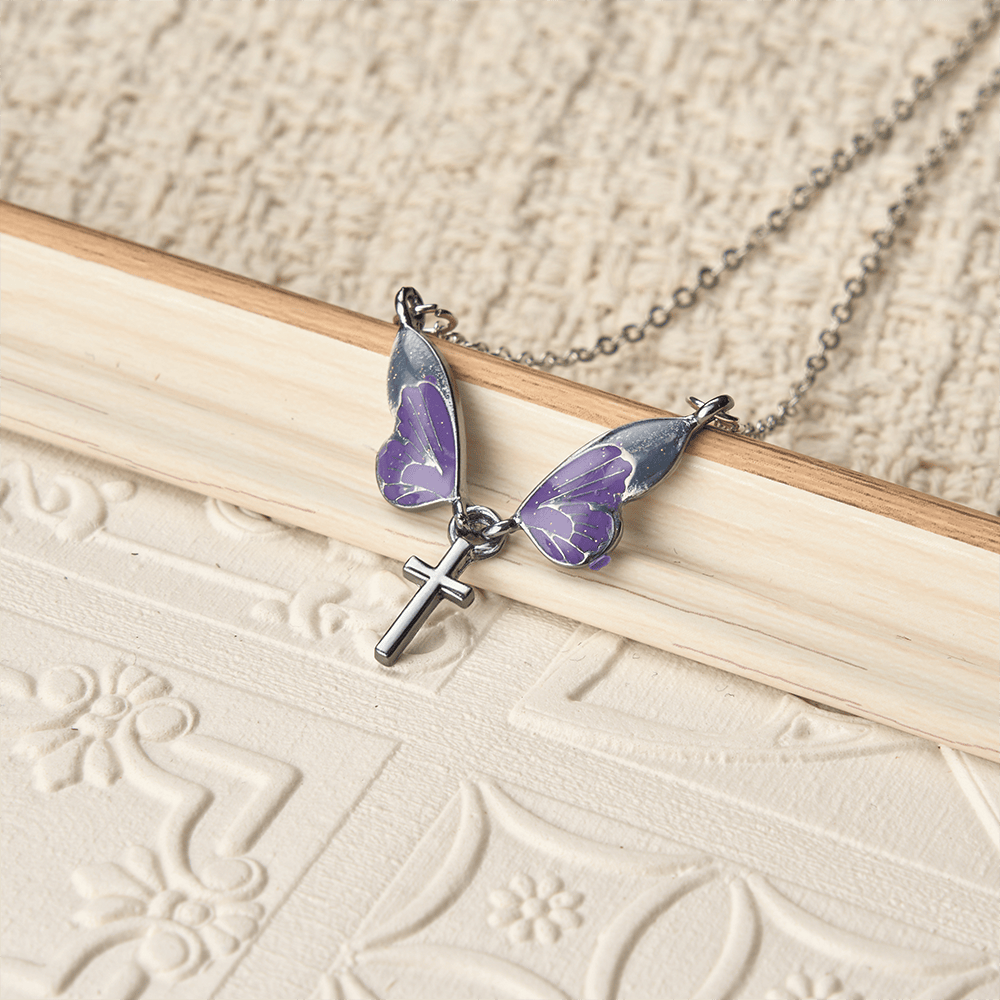 Christianartworkshop Verspielte Schmetterlingsflügel-Kreuz-Halskette: Ein strahlendes Symbol göttlichen Lichts und Hoffnung - image 1