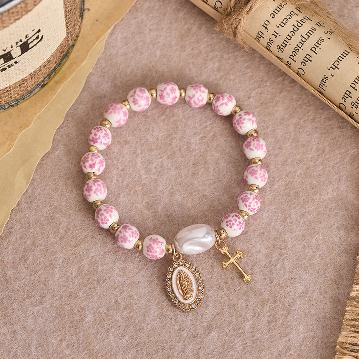 Christianartworkshop Blau-rosa Keramikperlenarmband mit Blumenmuster und großer weißer Akzentperle: Eine Erinnerung an göttliche Gnade - image 2