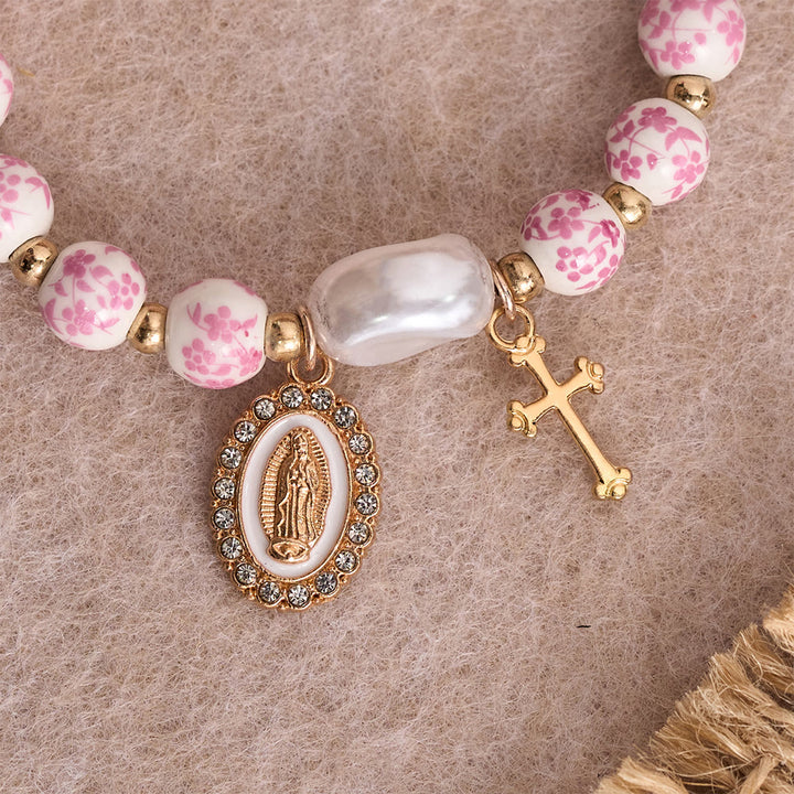 Christianartworkshop Blau-rosa Keramikperlenarmband mit Blumenmuster und großer weißer Akzentperle: Eine Erinnerung an göttliche Gnade - image 4
