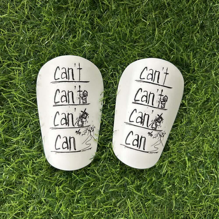 Christianartworkshop Inspirierende Can't to Can Fußball-Schienbeinschoner für Training & Spiele - Schwarzes Muster - 12 x 8 cm - image 1