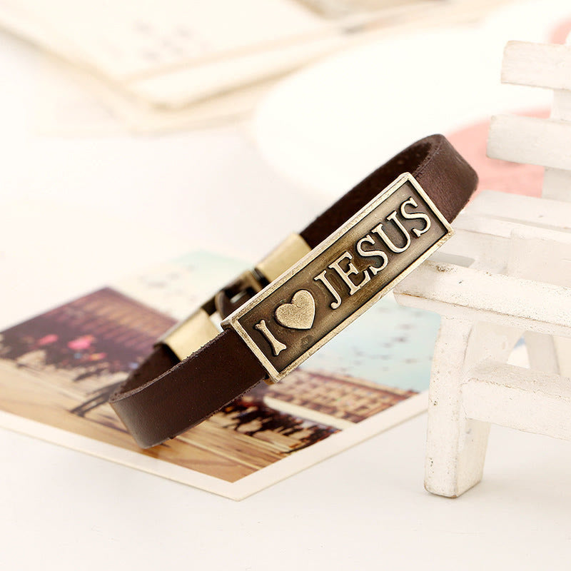 Christianartworkshop Antikisiertes Messing-Lederarmband „Ich liebe Jesus“ mit geprägtem Herzmotiv: Eine Erinnerung an die göttliche Liebe - image 1