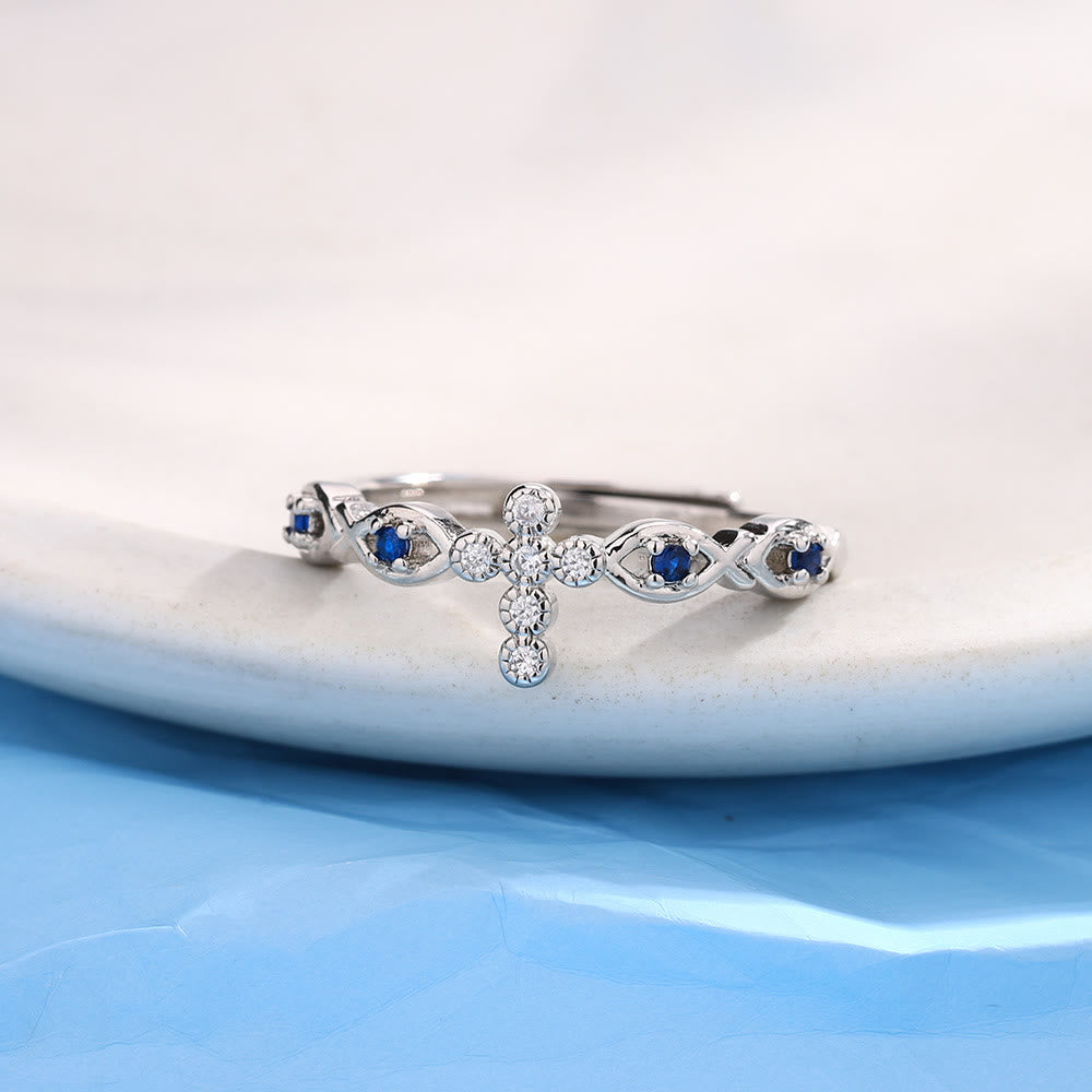 Christianartworkshop Zarter Kreuzring mit blauen Zirkonia-Akzenten: Ein Symbol für Glauben und Gelassenheit - Kreuz (Geeignet für US-Größen 7-9) - image 0