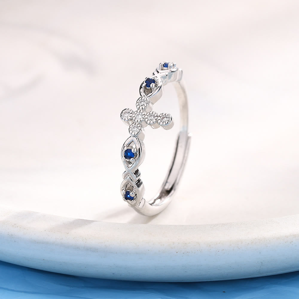 Christianartworkshop Zarter Kreuzring mit blauen Zirkonia-Akzenten: Ein Symbol für Glauben und Gelassenheit - image 3