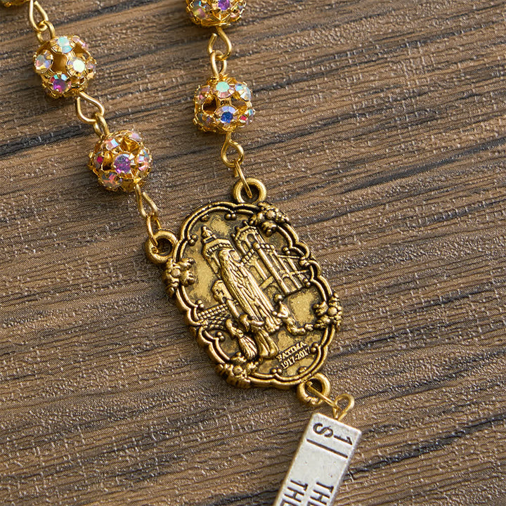 Christianartworkshop Sechsblättriger Rosenkranz mit goldenen Strasssteinen und dem Motiv Unserer Lieben Frau von Fatima - image 8