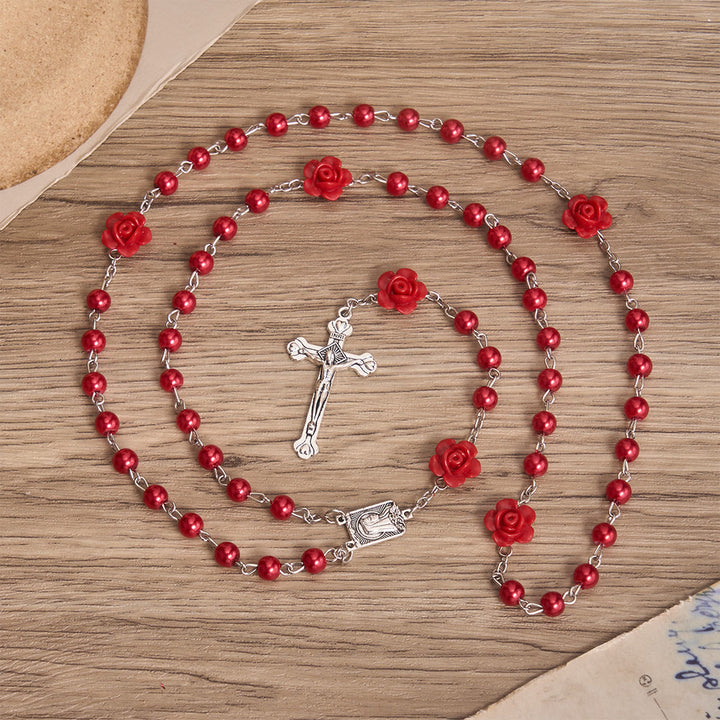 Christianartworkshop Glatter, perlenartiger Rosenkranz mit runden Perlen, Rosenornament und einem Anhänger der Jungfrau Maria in der Mitte. - Rot - image 4