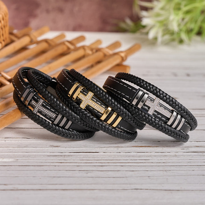 Christianartworkshop Mehrlagiges geflochtenes Lederarmband mit Zirkonia-Kreuz und dreifarbigem Metall-Zwischenstück - image 0