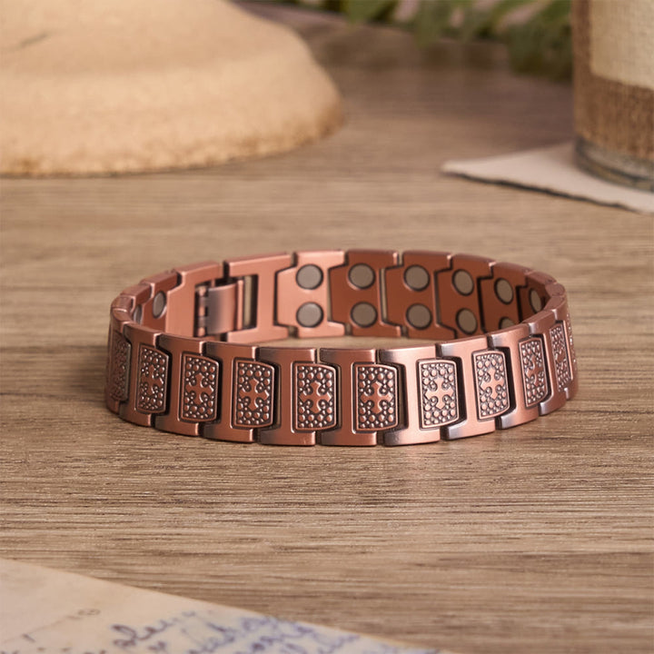 Christianartworkshop Rechteckiges Gliederarmband mit eingefasstem Kreuzmotiv aus Perlen und verstellbarem Faltverschluss - Bronze - image 0