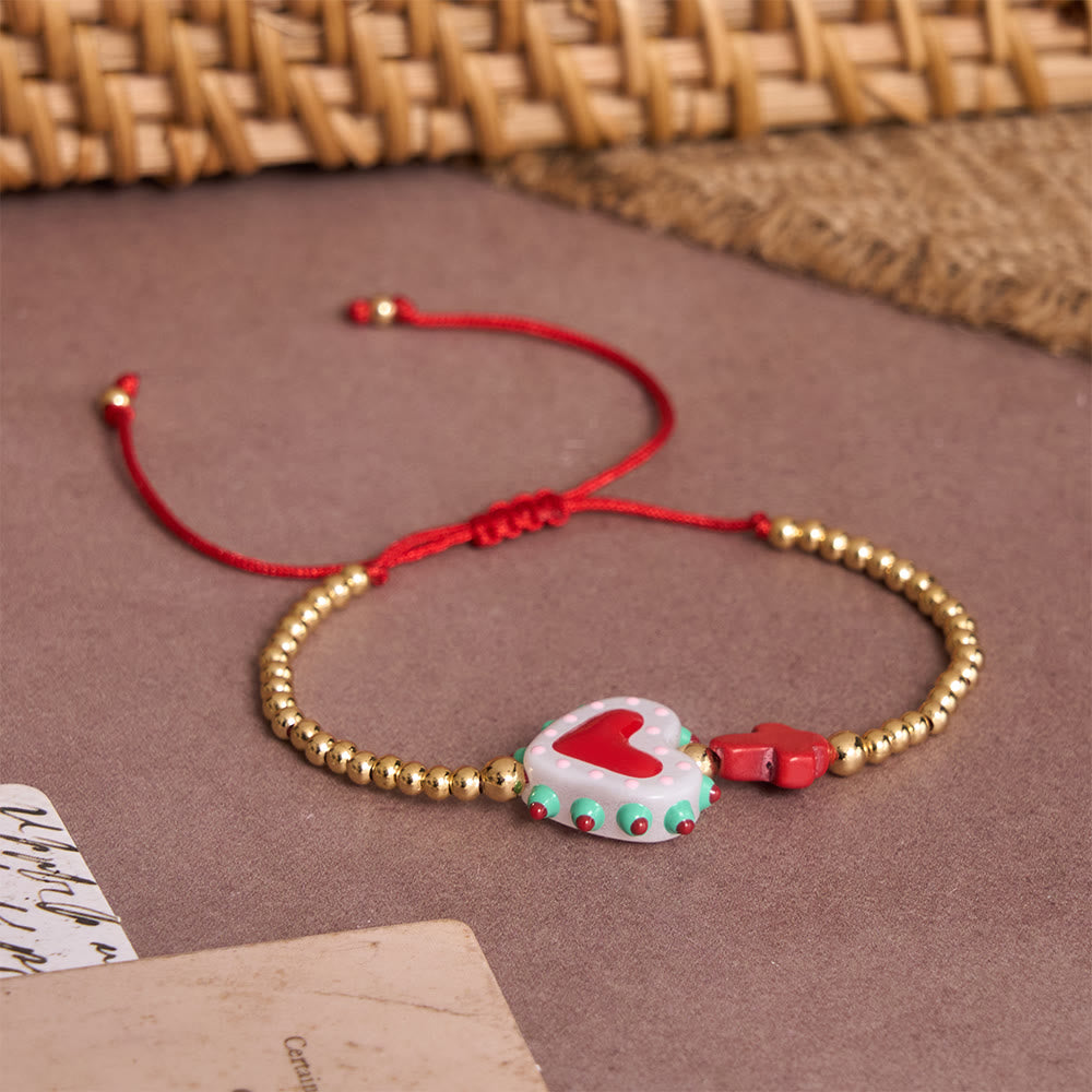 Christianartworkshop Armband im Cartoon-Stil mit handverziertem Herz-Jesu-Motiv und kleinem Kreuz, verziert mit goldenen Perlen und verstellbarer Kordel - image 11