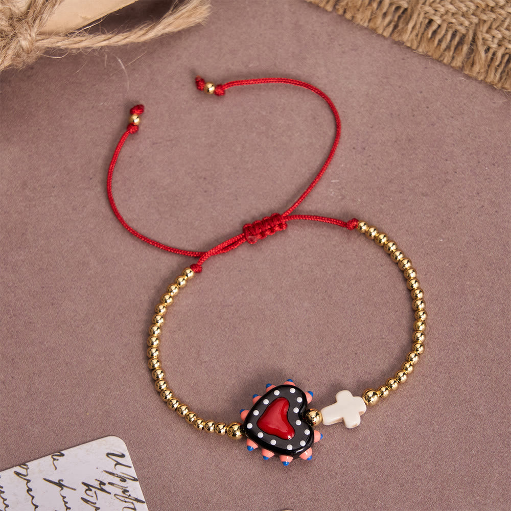 Christianartworkshop Armband im Cartoon-Stil mit handverziertem Herz-Jesu-Motiv und kleinem Kreuz, verziert mit goldenen Perlen und verstellbarer Kordel - A - image 2
