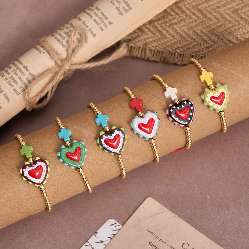 Christianartworkshop Armband im Cartoon-Stil mit handverziertem Herz-Jesu-Motiv und kleinem Kreuz, verziert mit goldenen Perlen und verstellbarer Kordel - image 0