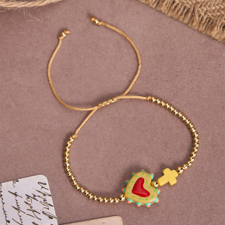 Christianartworkshop Armband im Cartoon-Stil mit handverziertem Herz-Jesu-Motiv und kleinem Kreuz, verziert mit goldenen Perlen und verstellbarer Kordel - B - image 4