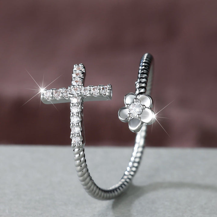 Christianartworkshop Offener Manschettenring mit Zirkonkreuz im Pavé-Stil und Zirkonblumen-Akzent: Ein Symbol zarter Anmut und unerschütterlichen heiligen Glaubens - image 4