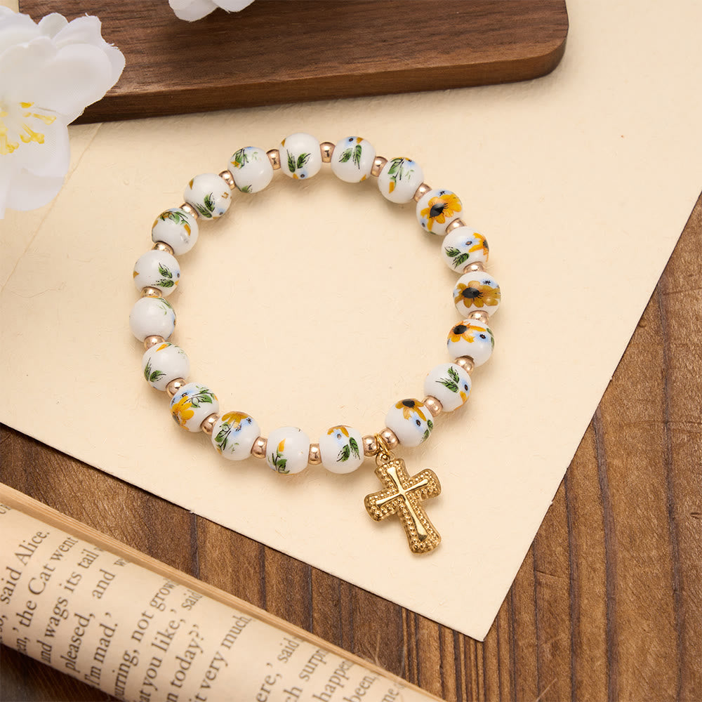 Christianartworkshop Elastisches Armband mit vier floralen Keramikperlen und goldfarbenem Kreuzanhänger: Ein Symbol sanfter himmlischer Gnade - Gelb - image 4