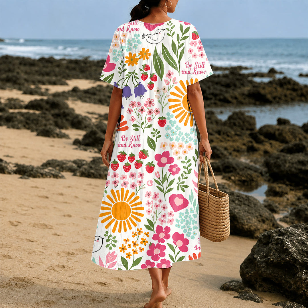 Christianartworkshop „Sei still und erkenne“ Midikleid mit Blumen- und Sonnenprint, V-Ausschnitt und kurzen Ärmeln - image 2