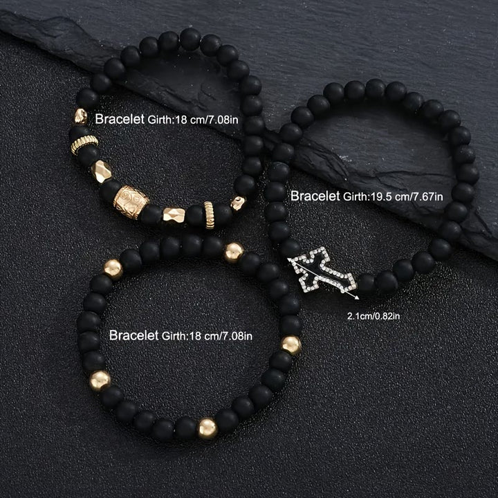 Christianartworkshop Mehrlagiges, dehnbares Armband aus mattschwarzen Steinperlen mit Zirkonia-Kreuz und gravierten Goldzwischenstücken - image 8
