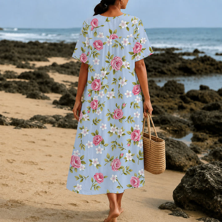 Christianartworkshop Sommerliches Oversize-Midikleid mit Blumenmuster, gekreuztem Grafikprint, V-Ausschnitt und kurzen Ärmeln - image 4