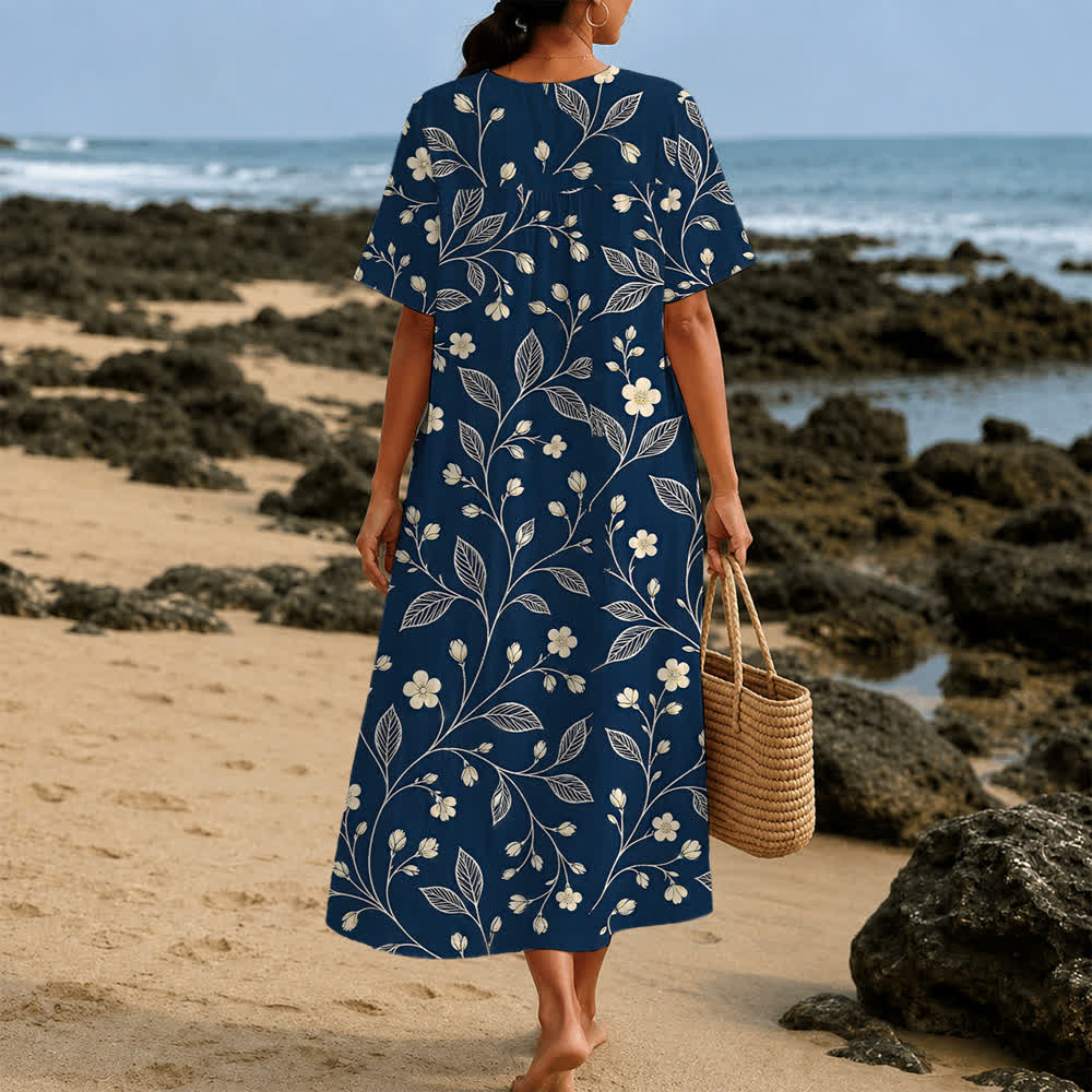 Christianartworkshop Sommerliches Oversize-Midikleid mit Blumenmuster, gekreuztem Grafikprint, V-Ausschnitt und kurzen Ärmeln - image 7