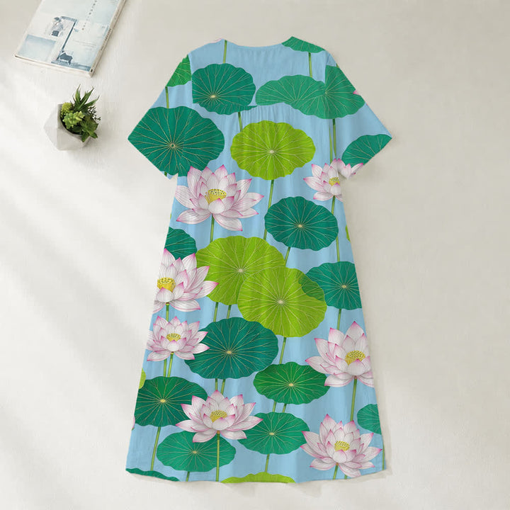 Christianartworkshop Sommerliches Oversize-Midikleid mit Blumenmuster, gekreuztem Grafikprint, V-Ausschnitt und kurzen Ärmeln - image 14