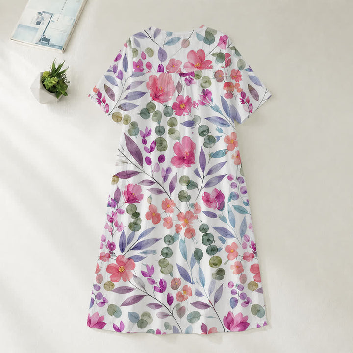 Christianartworkshop Sommerliches Oversize-Midikleid mit Blumenmuster, gekreuztem Grafikprint, V-Ausschnitt und kurzen Ärmeln - image 18