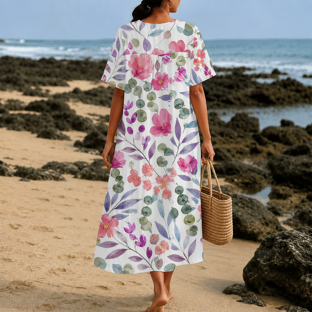 Christianartworkshop Sommerliches Oversize-Midikleid mit Blumenmuster, gekreuztem Grafikprint, V-Ausschnitt und kurzen Ärmeln - image 20
