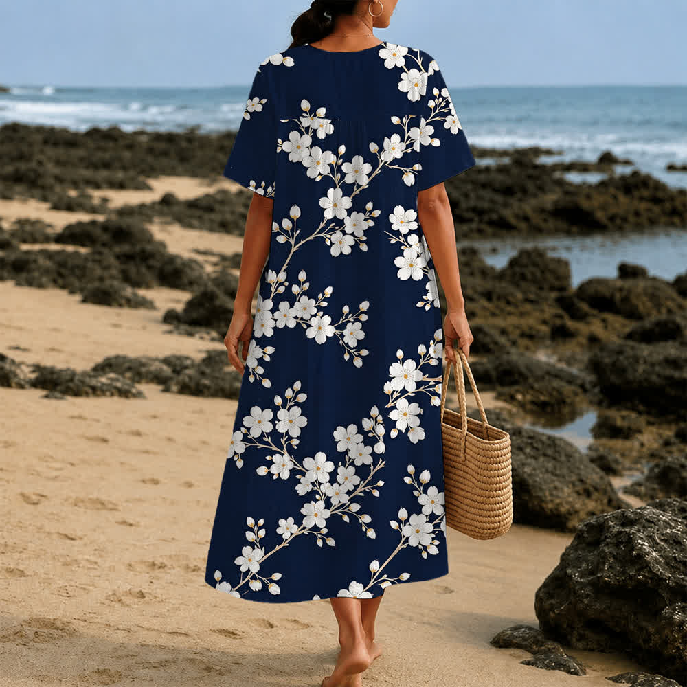 Christianartworkshop Sommerliches Oversize-Midikleid mit Blumenmuster, gekreuztem Grafikprint, V-Ausschnitt und kurzen Ärmeln - image 23