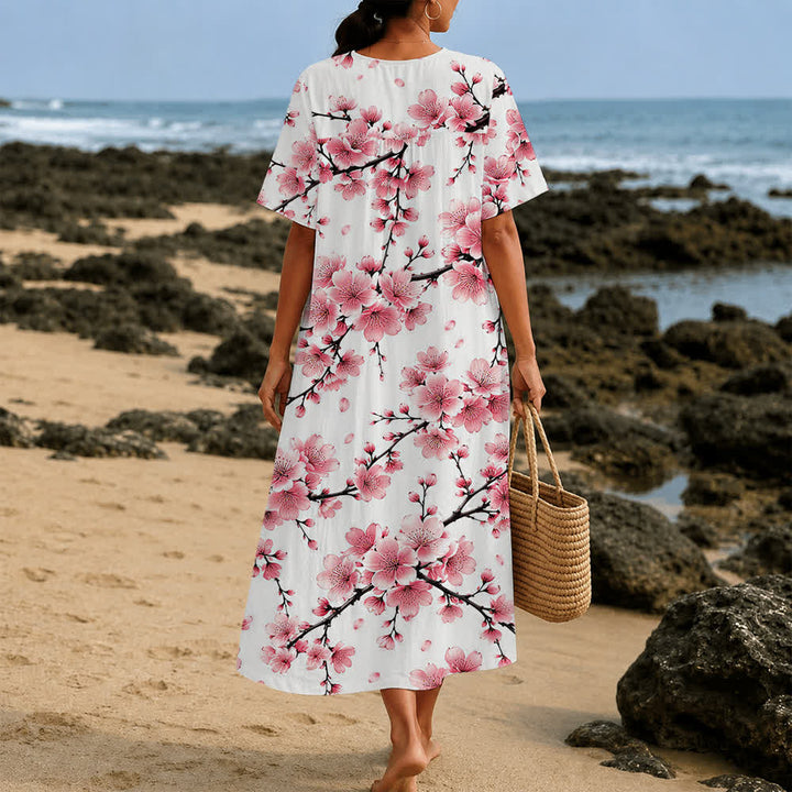Christianartworkshop Sommerliches Oversize-Midikleid mit Blumenmuster, gekreuztem Grafikprint, V-Ausschnitt und kurzen Ärmeln - image 28