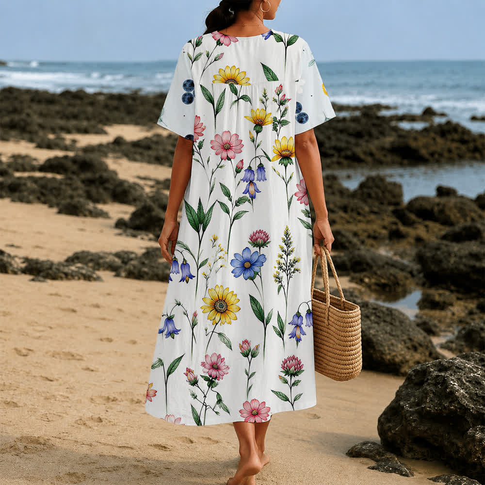 Christianartworkshop Sommerliches Oversize-Midikleid mit Blumenmuster, gekreuztem Grafikprint, V-Ausschnitt und kurzen Ärmeln - image 32