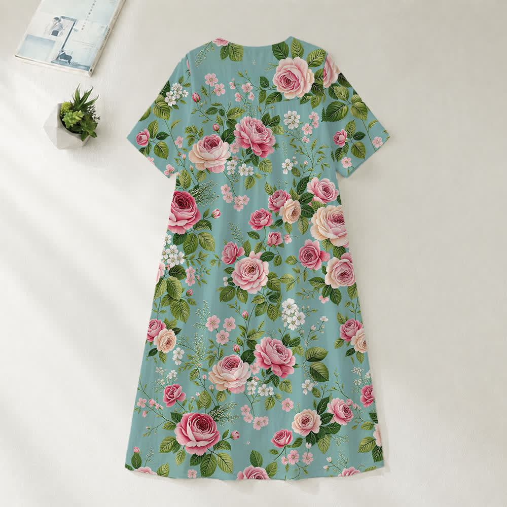 Christianartworkshop Sommerliches Oversize-Midikleid mit Blumenmuster, gekreuztem Grafikprint, V-Ausschnitt und kurzen Ärmeln - image 34