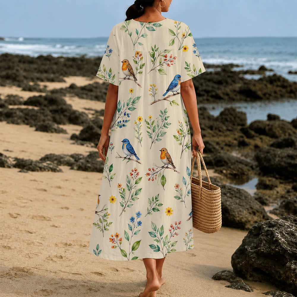 Christianartworkshop Sommerliches Oversize-Midikleid mit Blumenmuster, gekreuztem Grafikprint, V-Ausschnitt und kurzen Ärmeln - image 40