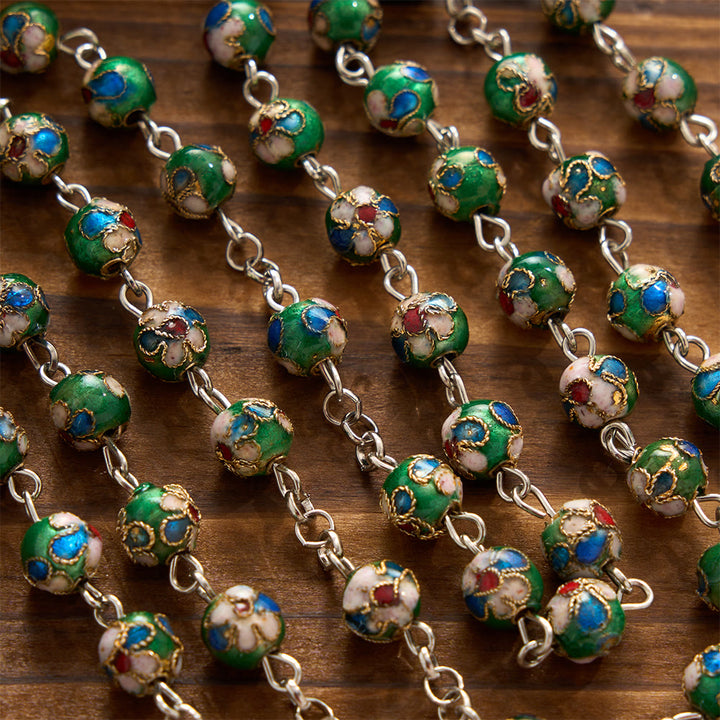 Christianartworkshop Mehrfarbiger Rosenkranz mit floralem Cloisonné-Emaillekreuz und Marienmotiv: Symbol lebendiger, schützender göttlicher Gnade - image 1