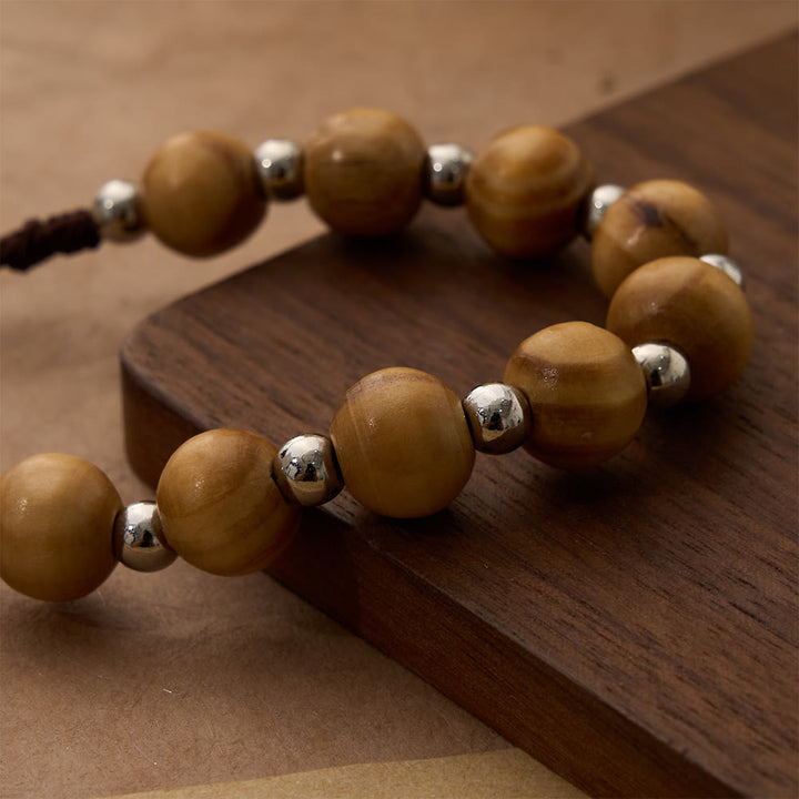Christianartworkshop Rosenkranzarmband aus Holzkreuz: Ein anmutiges Zeichen stillen, betenden Friedens - image 2
