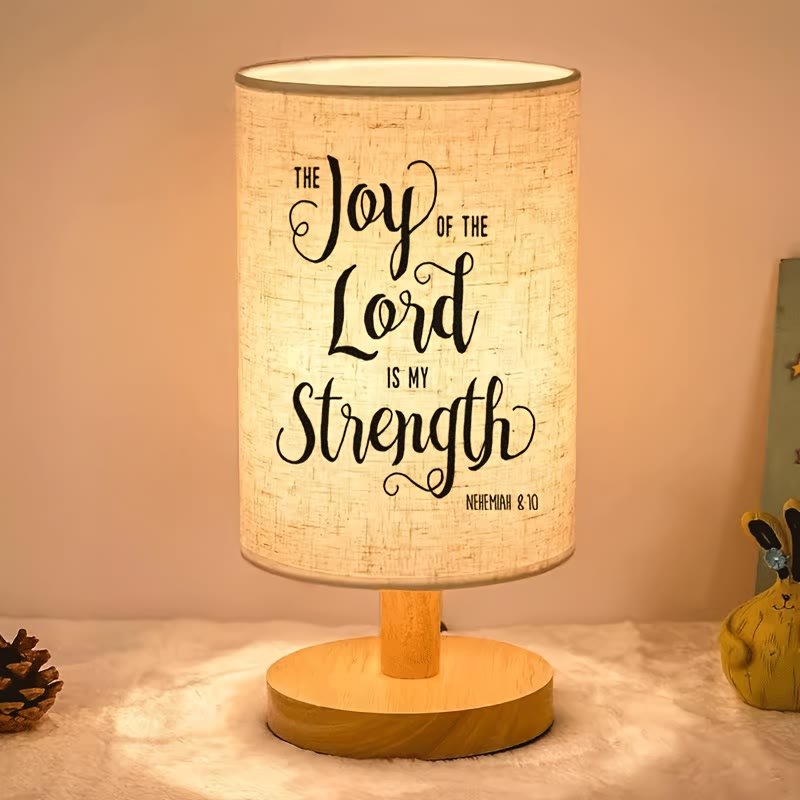 Christianartworkshop Tischlampe mit Stoffschirm und Fuß aus Naturholz und dem Bibelvers „Die Freude des Herrn ist meine Stärke“: Ein Ort der nächtlichen, geistlichen Ruhe - image 1