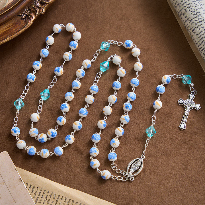 Christianartworkshop Rosenkranz mit Kreuz und Kreuz, hellblaue Keramikperlen mit Blumenmuster - image 5