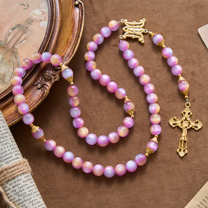 Christianartworkshop Kreuz mit schimmernden Katzenaugenperlen und Rosenkranz mit Bogen und Marienmotiv - Verträumter Rosenkranz mit violettem Farbverlauf - image 0
