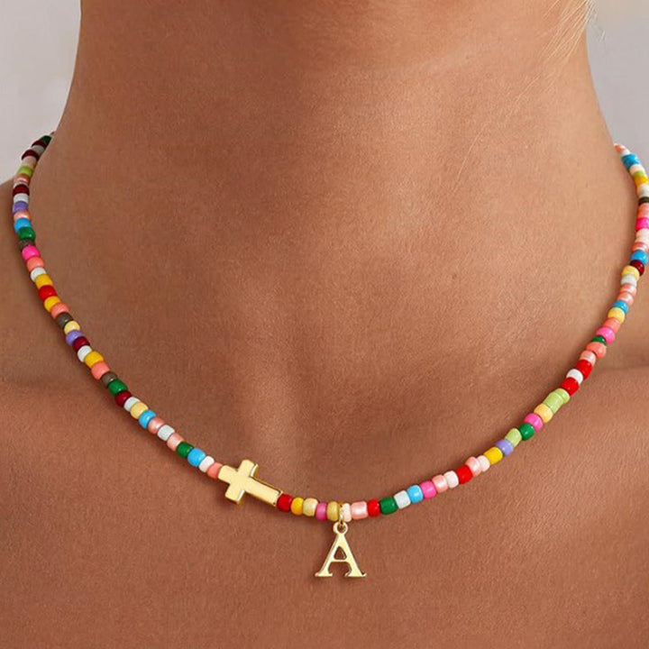 Christianartworkshop Personalisierte Halskette mit Buchstabenkreuz-Anhänger und leuchtenden Perlen: Zeitloses Symbol sanfter himmlischer Fürsorge - A - image 0