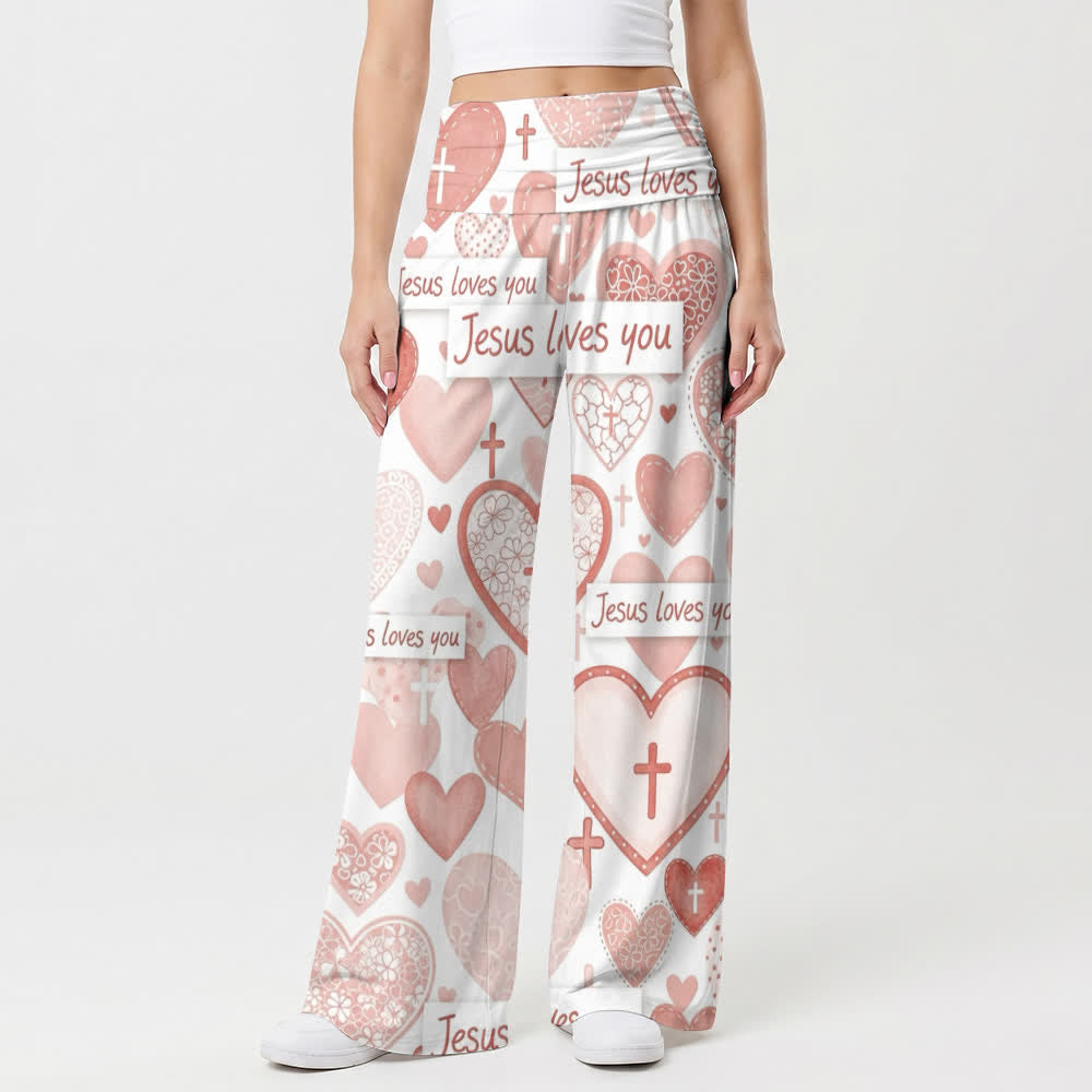 Christianartworkshop Pinkfarbene Damenhose mit weitem Bein und dem Schriftzug „Jesus liebt dich“ mit Herz- und Kreuzmotiv. - image 1