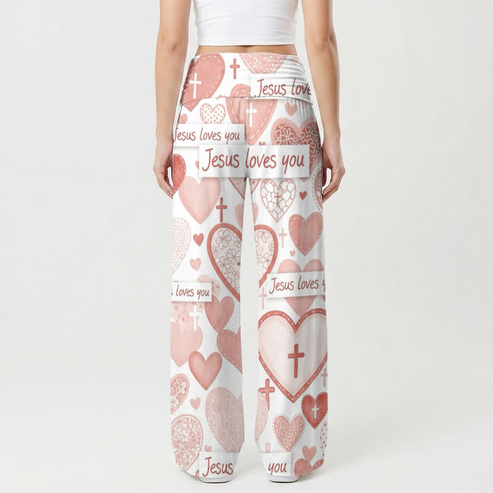 Christianartworkshop Pinkfarbene Damenhose mit weitem Bein und dem Schriftzug „Jesus liebt dich“ mit Herz- und Kreuzmotiv. - image 2