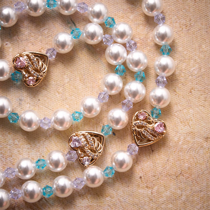 Christianartworkshop Glänzender Rosenkranz aus Imitationsperlen mit Strass-Schwanenherz-Anhängern, Marienmedaille und juwelenbesetztem Kruzifix - image 5