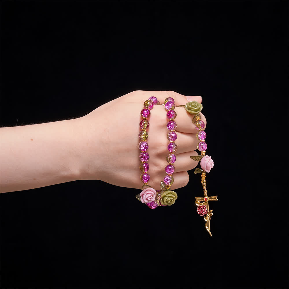 Christianartworkshop Rosenkranz aus rosa und grünen, facettierten Glasperlen mit Crackle-Effekt und Rosenmotiven, Marienkreuz - image 1
