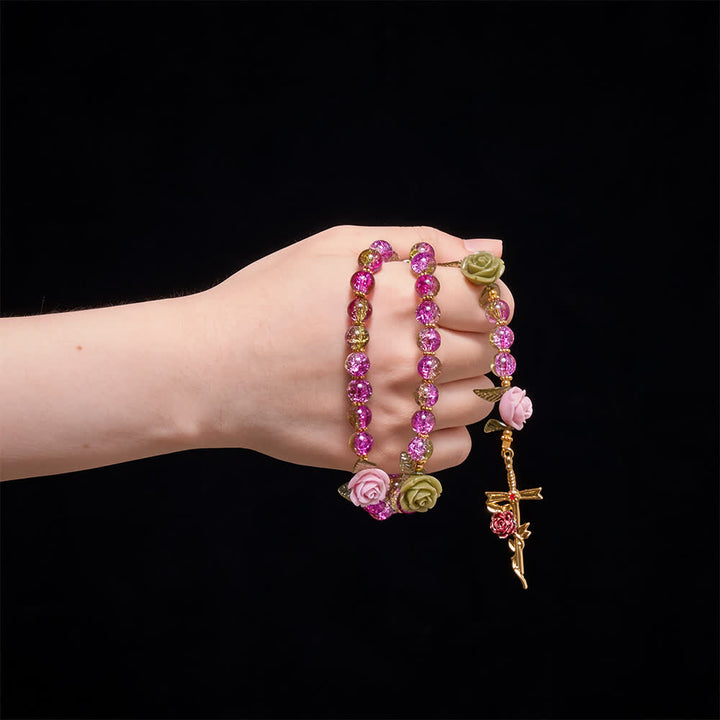 Christianartworkshop Rosenkranz aus rosa und grünen, facettierten Glasperlen mit Crackle-Effekt und Rosenmotiven, Marienkreuz - image 1