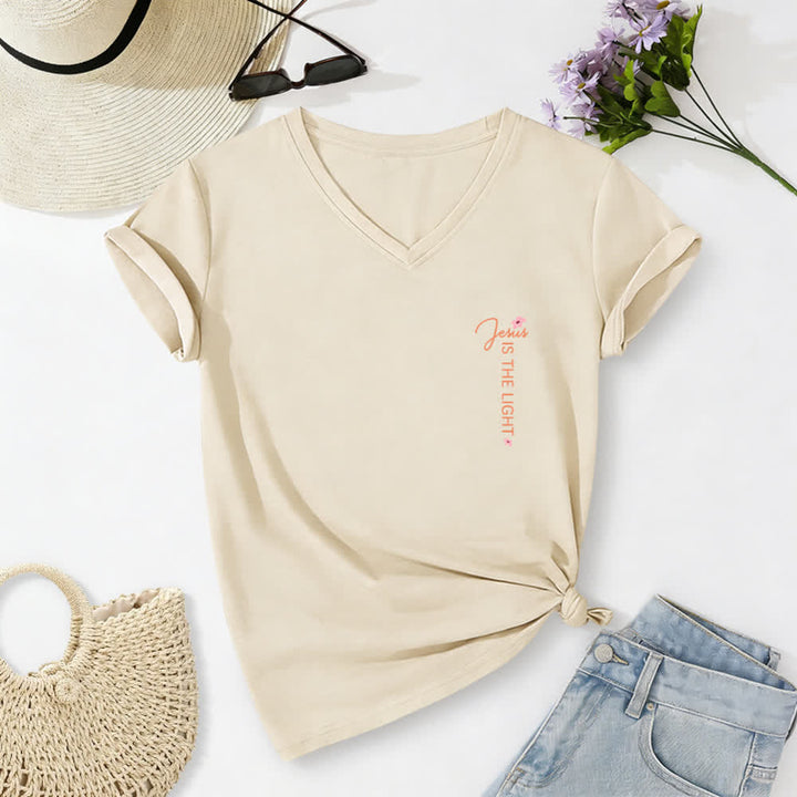 Christianartworkshop Doppelseitiges T-Shirt mit Blumenmuster und V-Ausschnitt: „Jesus ist das Licht – Wandelt im Glauben, nicht im Sehen“. - image 1